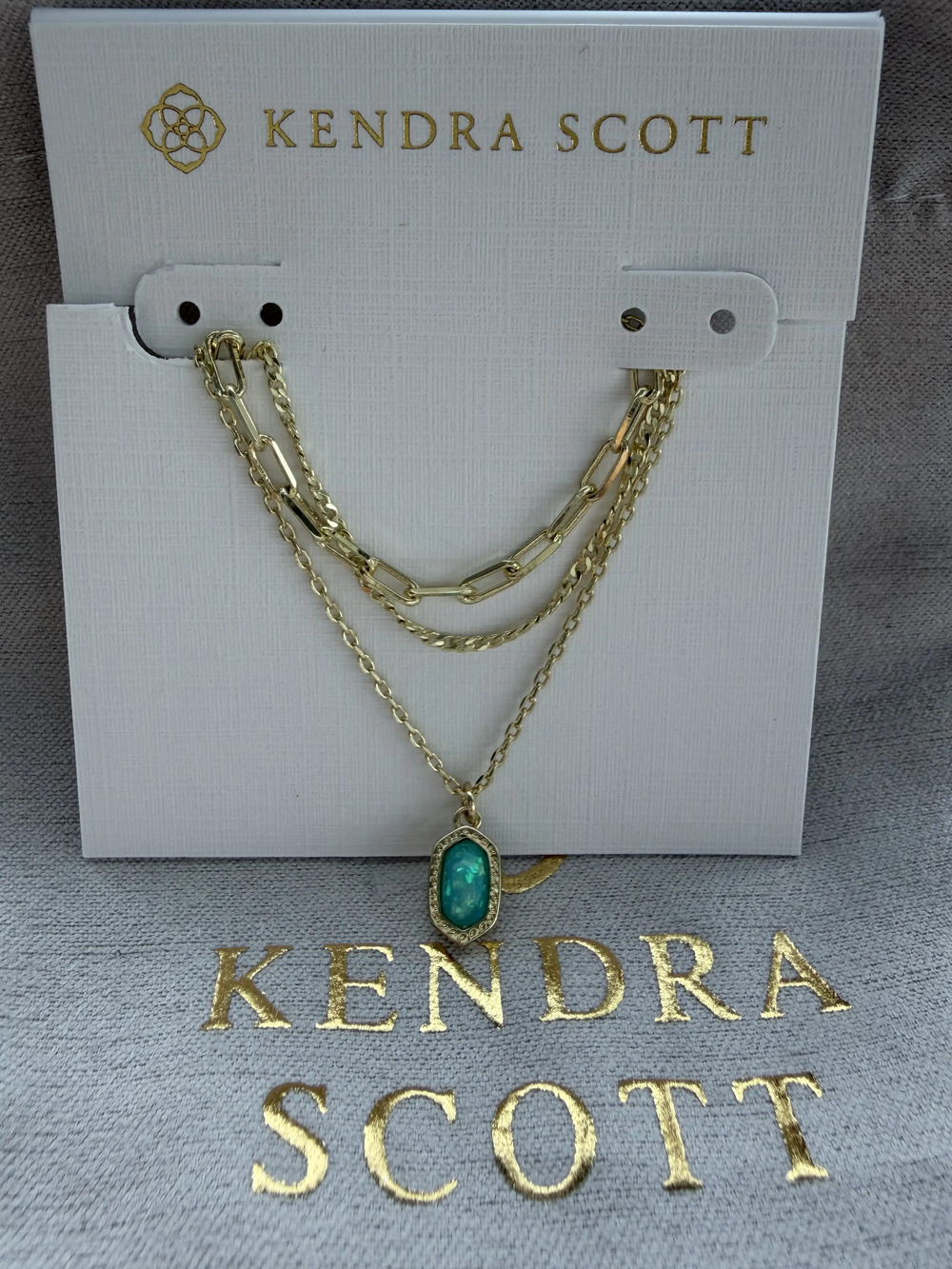 Kendra Scott Elisa pendant multi-strand necklace with coral and green gemstones